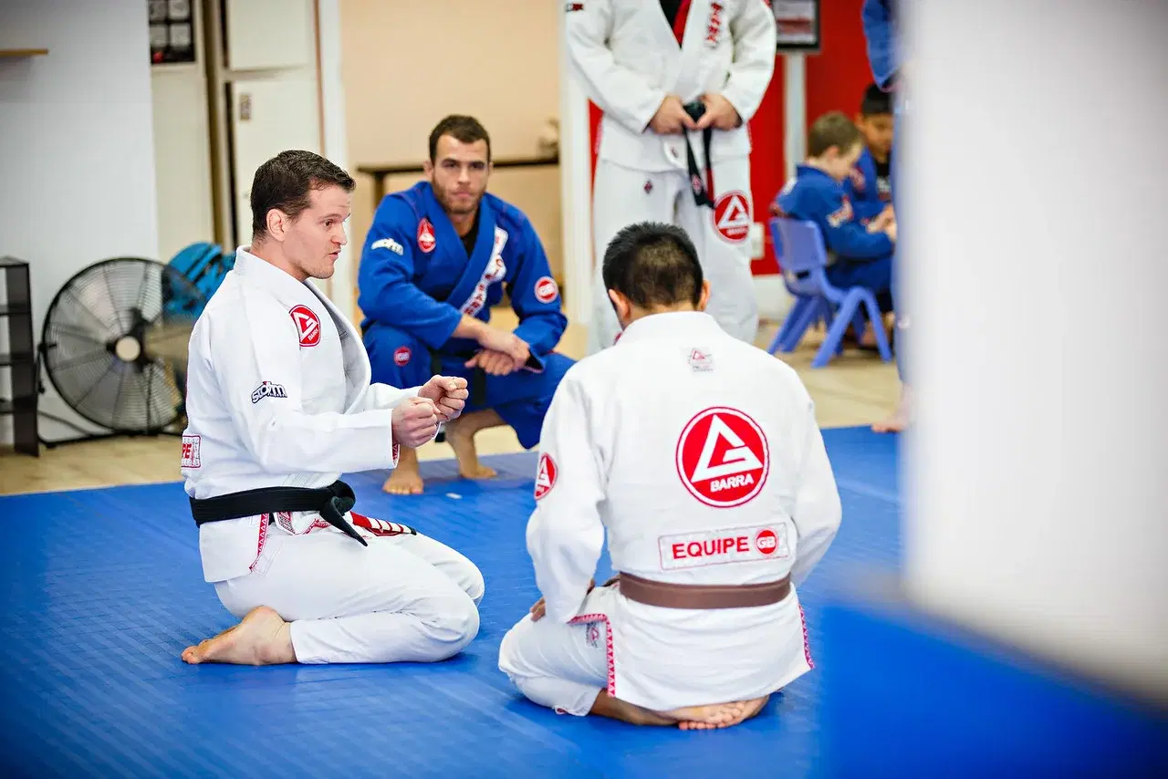 A Gracie Barra student smiling on the mats